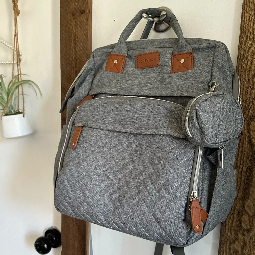 Boutique Large Diaper Bag, Backpack, Bassinet, Tech Charging Station all in one